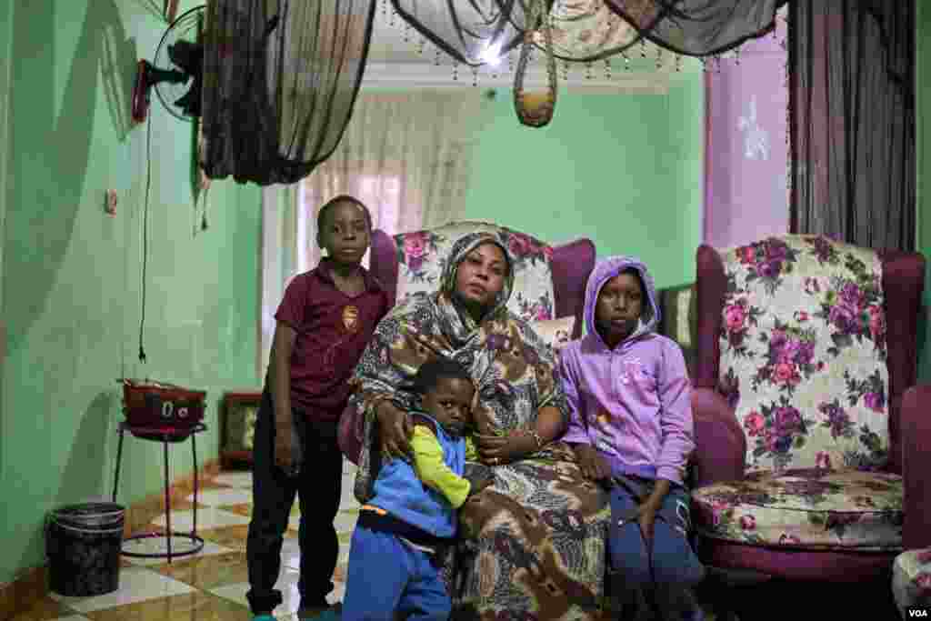 Eman, from the Nuba Mountains in South Kordofan, Sudan. Her husband left her and she says, &quot;It is hard to find a proper job here. ... Life is expensive here; that is why I stopped sending my children to schools.&quot; In Cairo. (H. Elrasam/VOA)