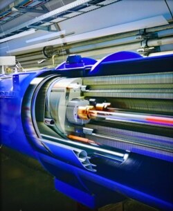 A cutaway illustration of the tube carrying the proton beams around the Large Hadron collider. The tube has been removed for maintenance. (Courtesy Robert Gumm)