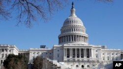Work continues on the stand for the inauguration of President-elect Donald Trump on the west front of the Capitol in Washington, D.C., Dec. 28, 2016.