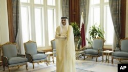 L'émir du Qatar, Cheikh Tamim ben Hamad Al-Thani, dans son palais à Doha, Qatar, le 3 août 2015.(Brendan Smialowski/Pool Photo via AP, File)