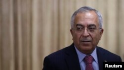 L'ancien Premier ministre palestinien Salam Fayyad, candidat émissaire des Nations unies en Libye, ici lors de la Conférence des pays de l’Asie de l’est pour le développement palestinien à Tokyo, 13 février 2013.