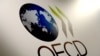 OECD ปรับคาดการณ์ขึ้นมุมมองเศรษฐกิจโลกเล็กน้อย ได้แรงหนุนจากวัคซีนโควิด