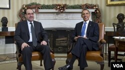 Presiden Barack Obama menerima kunjungan PM Irak Nouri al-Maliki (kiri) di Gedung Putih (12/12).
