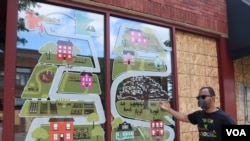 Ruhel Islam, owner of Gandhi Mahal Restaurant, which was torched by rioters following George Floyd's death while in police custody, remembers artwork painted on his restaurant that depicts his journey from a small village in Bangladesh to Minnesota.