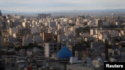 FILE - A view of Qom city, Iran, March 24, 2020. The first poisoning cases emerged in late November in Qom, some 125 kilometers southwest of Iran's capital, Tehran.