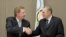 United States Olympic Committee chairman Larry Probst, left, and Olympic Committee President Jacques Rogge shake hands after signing an agreement between the IOC and the USOC at the SportAccord conference in Quebec City, May 24, 2012 (AP).