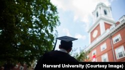 Harvard University celebrates Commencement 2013. Graduates await their degrees from Eliot House. Stephanie Mitchell/Harvard Staff Photographer