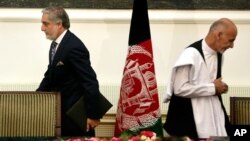 2014-yil 21-sentabr kuni olingan bu suratda Afg'onistonning ikki rahbari tsvirlangan. 