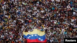 Opposition supporters take part in a rally against Venezuelan President Nicolas Maduro's government, in Caracas, Venezuela Jan. 23, 2019. 