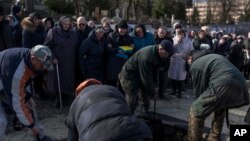 დაკრძალვა ქ ლვივის სასაფლაოზე. უკრაინა, 21 თებერვალი, 2023 წ.