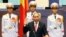 Vietnamese Prime Minister Nguyen Xuan Phuc takes the oath of office after being re-elected by the National Assembly in Hanoi, July 26, 2016.