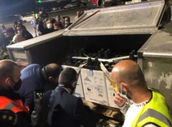 FILE - A batch of the Pfizer-BioNTech COVID-19 vaccine arrives at Queen Alia International Airport in Amman, Jordan, January 11, 2021.
