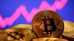 Quiz - Bitcoin Hits Record High as Digital Currency Company Goes Public