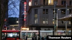People walk through the city centre in Sydney