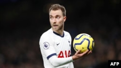 Christian Eriksen, (Hoto by Adrian DENNIS / A)