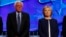 Democratic presidential candidate Senator Bernie Sanders and former Secretary of State Hillary Clinton stand together before the start of the first official Democratic candidates debate of the 2016 presidential campaign in Las Vegas, Nevada Oct. 13, 2015.