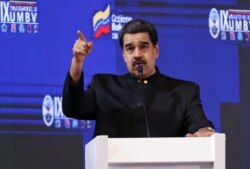FILE - Venezuelan President Nicolas Maduro speaks during the IX anniversary of the Bolivarian Military University of Venezuela in Caracas, Sept. 3, 2019.