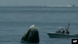 کپسول درگن اسپیس اکس فضانوردان آمریکایی را به سلامت به زمین بازگرداند - ۲ اوت ۲۰۲۰