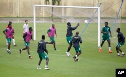Members of Burkina Faso's soccer team play a training game in Libreville, Gabon, Jan. 31, 2017, ahead of their African Cup of Nations semi-finals match against Egypt.