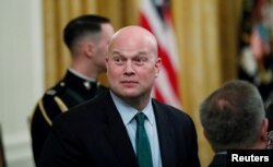 FILE - Acting U.S. Attorney General Matthew Whitaker attends a ceremony at the White House in Washington, Nov. 16, 2018.