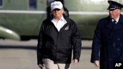 President Donald Trump walks to board Air Force One for a trip to the southern border, Jan. 10, 2019, in Andrews Air Force Base, Md.