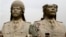 FILE - U.S. soldiers walk past two gigantic status of former Iraqi President Saddam Hussein in Baghdad, March 20, 2009.