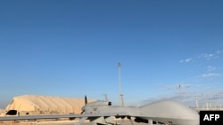 A picture taken on Jan. 13, 2020, during a press tour organized by the US-led coalition fighting the remnants of the Islamic State group, shows US army drones at the Ain al-Asad airbase in the western Iraqi province of Anbar. 