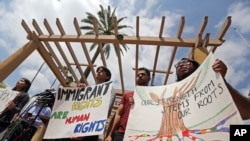 FILE - Supporters of Deferred Action for Childhood Arrivals demonstrate outside a federal courthouse in Pasadena, Calif., May 15, 2018.
