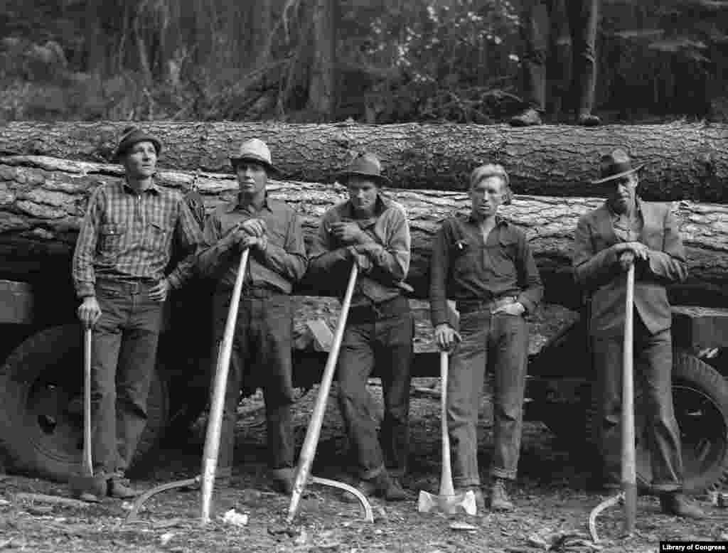 &quot;Five Members of Ola Self-Help Sawmill Co-Op&quot; by Dorothea Lange, Gem County, Idaho, 1939. (Photo credit: Prints &amp; Photographs Division, Library of Congress)