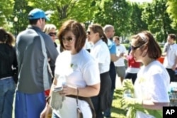 The National Mall gets spruced up thanks to volunteers who rake, hoe, mulch and pick up debris.