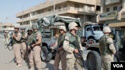 Tentara AS yang sedang bertugas di Irak. Sedikitnya 15 tentara AS telah tewas dalam bulan ini di Irak.