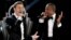 Recording artists Just Timberlake, left, and Jay-Z performing at the 55th annual Grammy Awards in Los Angeles, Feb. 10, 2013.