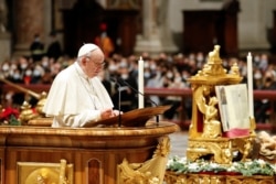 Pope Francis attends the vespers service in St. Peter's Basilica at the Vatican, Dec. 31, 2021.