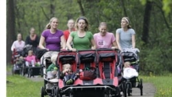 Mothers and their babies in a park in Strongsville, Ohio, in a fitness class called "Baby Boot Camp." The classes are offered nationwide to help pregnant women and new mothers get fit.