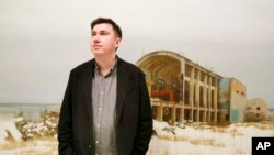 Pavel Otdelnov, a Russian artist who grew up in Dzerzhinsk, the center of the nation's chemical industries 355 kilometers (220 miles) east of Moscow, focused on the city, one of the most polluted in Russia, in his new 'Promzona' art show. (AP Photo/Ivan K