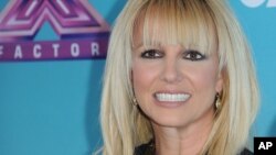Britney Spears arrives at the "X Factor" season finale press conference at CBS Studios on Dec. 17, 2012, in Los Angeles.