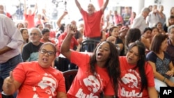 Supporters of Brazilian former President Luiz Inacio Lula da Silva shout slogans as they wait for his appearance at the metal workers union headquarters, in Sao Bernardo do Campo, Sao Paulo, Brazil, April 4, 2018.