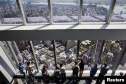 Visitors to the newly opened One World Observatory in New York, May 29, 2015.