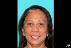This undated photo provided by the Las Vegas Metropolitan Police Department shows Marilou Danley. Danley, 62, returned to the United States from the Philippines on Oct. 3, 2017, and was met at Los Angeles International Airport by FBI agents, according to law enforcement officials.