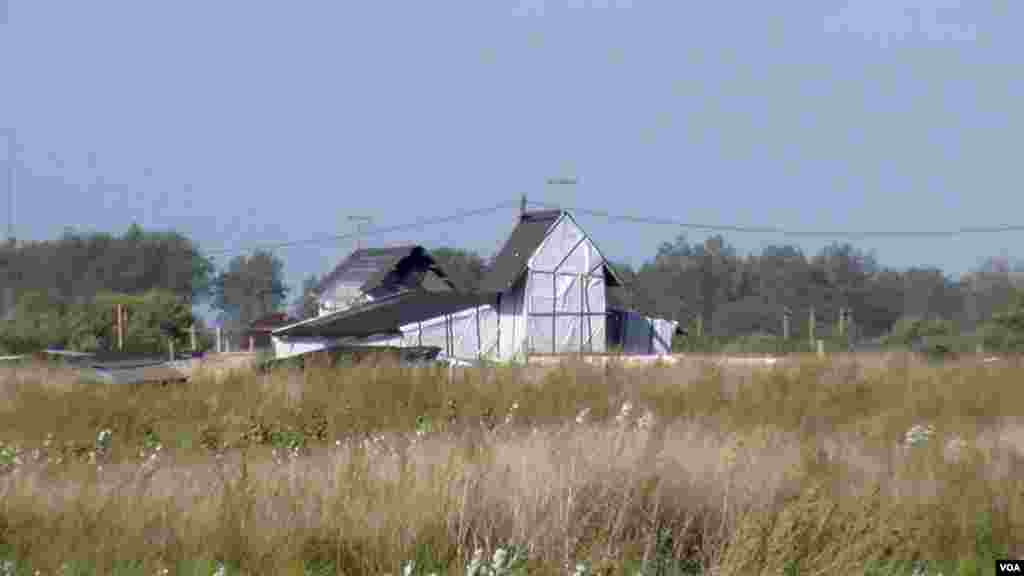 A church is seen in the Jungle migrant camp in Calais, France. (L. Bryant/VOA)