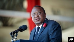 Kenya's President Uhuru Kenyatta speaks during the state funeral of Kenya's former president Daniel arap Moi, at Nyayo Stadium in the capital Nairobi, Feb. 11, 2020. 