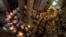 Christian clergymen hold candles during the Easter Sunday procession at the Church of the Holy Sepulcher, traditionally believed by many to be the site of the crucifixion and burial of Jesus Christ, in Jerusalem's Old City, April 20, 2014.