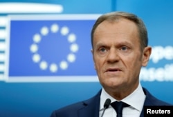 FILE - European Council President Donald Tusk addresses a news conference during a European Union leaders summit in Brussels, Belgium, Dec. 15, 2017.
