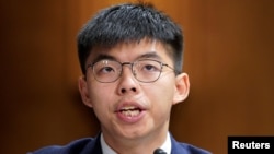 资料照片-香港活动人士黄之锋在华盛顿国会山出席关于香港抗议活动的国会听证会。(2019年9月17日)