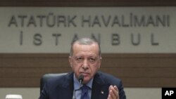 Presiden Turki Recep Tayyip Erdogan , in Istanbul, Monday, July 8, 2019. Erdogan says Russia's S-400 air defense missiles are currently being prepared to be flown to Turkey. Erdogan would not however say wh
