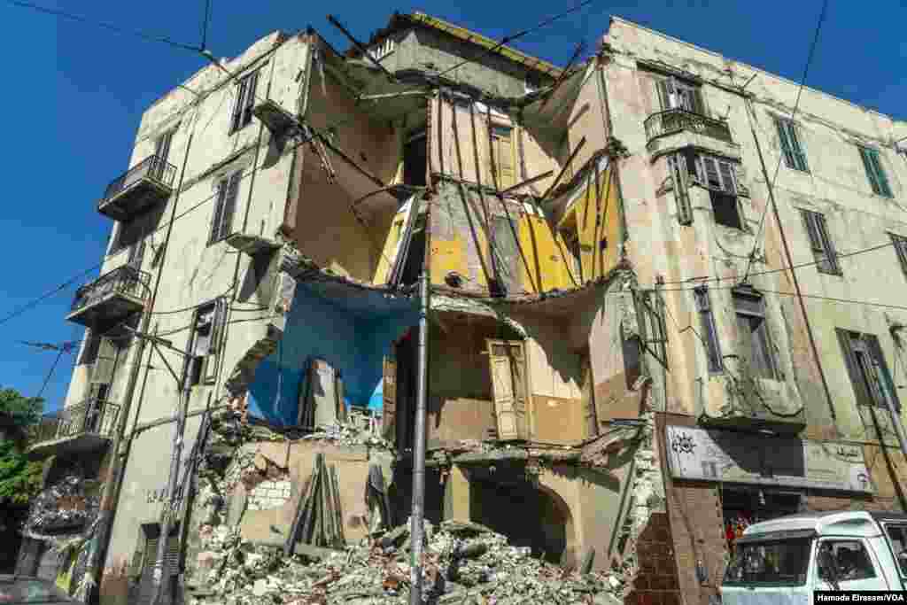 Locals say this building in Alexandria, Egypt, collapsed last year after frequent and sometimes deadly floods weakened the city infrastructure. (Hamada Elrasam/VOA) 
