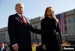 U.S. President Donald Trump and first lady Melania Trump attend the 9/11 observance at the National 9/11 Pentagon Memorial in Arlington, Virginia, Sept.11, 2017.