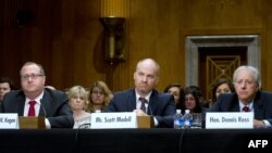 L-R: Dr. Frederick W. Kagan, Christopher DeMuth Chair and Director of the Critical Threats Project at the American Enterprise Institute, Scott Modell, testify before the US Senate Foreign Relations Committee, June 12, 2014 on Capitol Hill in Washington, DC. 