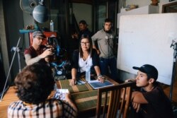 Champ Ensminger (lower right) directed and produced Yai Nin, a short documentary about his grandmother, Ninlawan Pinyo, the matriarch of the family.