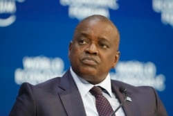 FILE - Botswana's President Mokgweetsi Masisi takes part in a panel discussion at the World Economic Forum in Davos, Switzerland, Jan. 21, 2020.